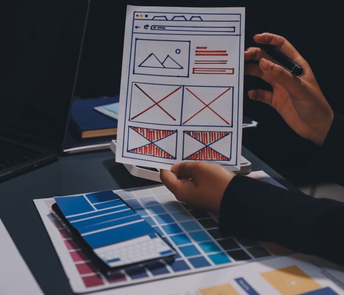 The designer team is designing the uxui system to make the uxui system work well on new phones and support system updates. Website development concept UI UX front end designer